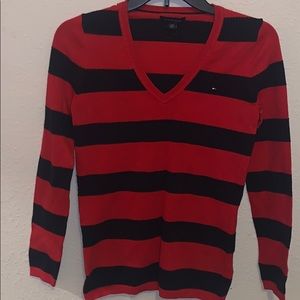 Red and blue striped sweater.